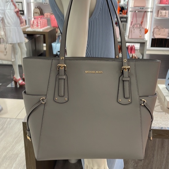 Voyager Small Saffiano Leather Tote Bag
Style# 30H1GV6T4T
NWT
COLOR: Pearl Gray - Picture 10 of 16